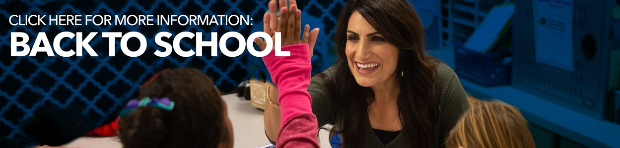 Teaching giving student high five: Click here for more information about the 2022-23 school year