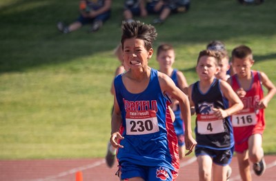 Student Running with determined look on face